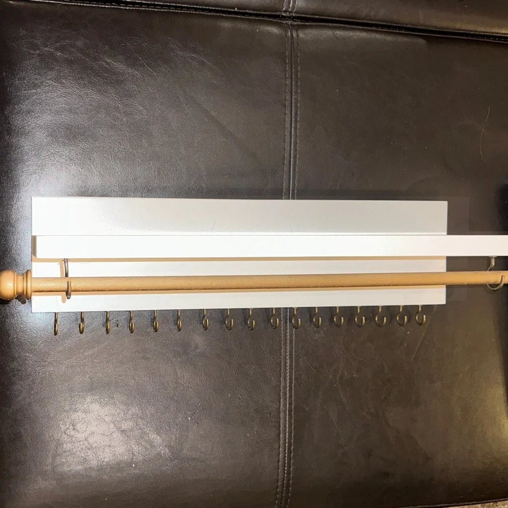 Adorable Nursery bow and clothing rod and shelf for baby girl rooms!